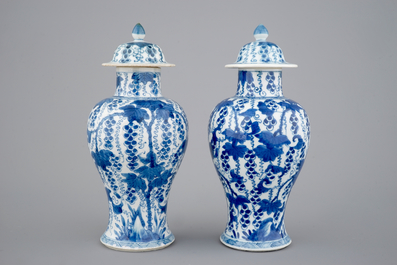 A pair of blue and white vases and covers, Kangxi, ca. 1700