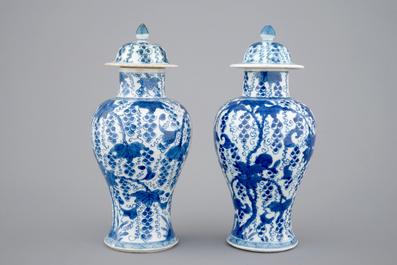 A pair of blue and white vases and covers, Kangxi, ca. 1700