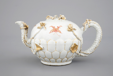 A Chinese relief-decorated gilt tea pot, Yongzheng, 18th C.
