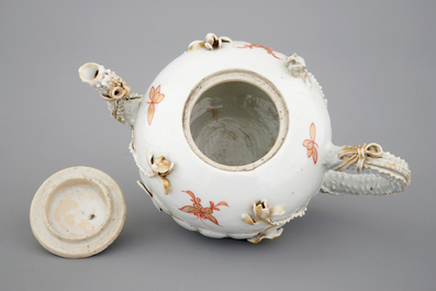 A Chinese relief-decorated gilt tea pot, Yongzheng, 18th C.