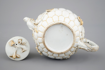 A Chinese relief-decorated gilt tea pot, Yongzheng, 18th C.