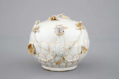 A Chinese relief-decorated gilt tea pot, Yongzheng, 18th C.