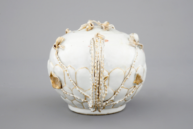 A Chinese relief-decorated gilt tea pot, Yongzheng, 18th C.