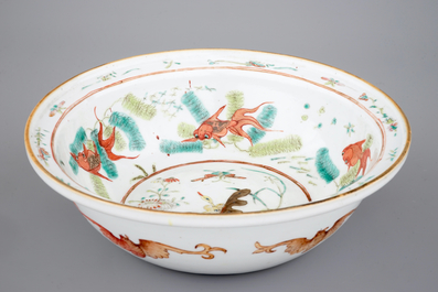 A Chinese polychrome bowl decorated with butterflies and fish, 19th C.
