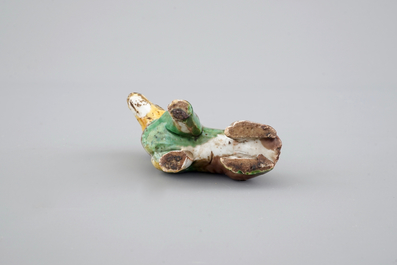 A Chinese spinach and egg glazed model of a dog, Kangxi, ca. 1700