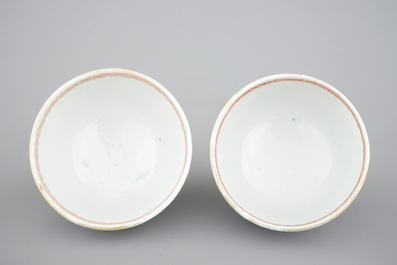 A pair of Chinese famile rose export porcelaine cup and saucers with cherry pickers, 18th C.