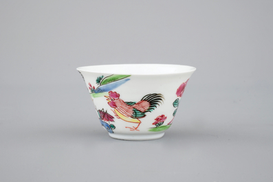 A Chinese famille rose porcelain cup and saucer with cocks, Yongzheng, 1722-1735