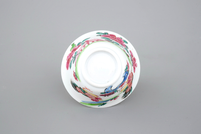 A Chinese famille rose porcelain cup and saucer with cocks, Yongzheng, 1722-1735