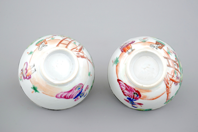 A pair of Chinese famile rose export porcelaine cup and saucers with cherry pickers, 18th C.