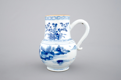 A Chinese blue and white jug with figures in a landscape, 18th C.