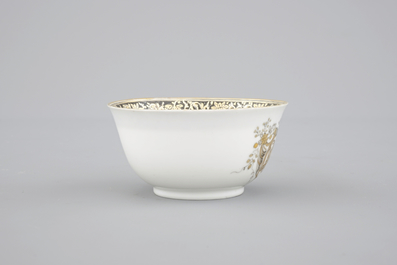 A Chinese grisaille and gilt export porcelain armorial cup and saucer, 18th C