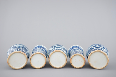 A Chinese bleu de Hue porcelain five piece garniture with acrobats, 19th C