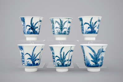 A set of six Japanese blue and white wine cups and saucers, 18/19th C.