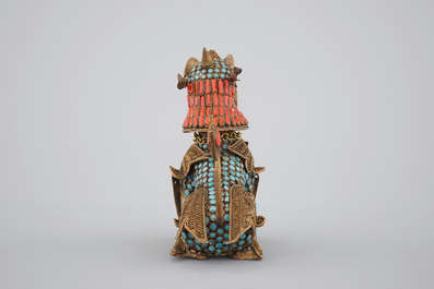 A Chinese or Sino-Tibetan filigree brass, turquoise and coral incense burner in the shape of a foo dog, 20th C.