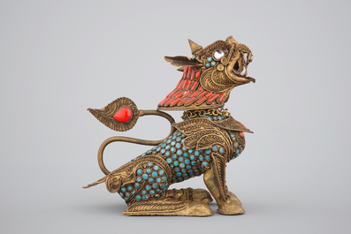 A Chinese or Sino-Tibetan filigree brass, turquoise and coral incense burner in the shape of a foo dog, 20th C.