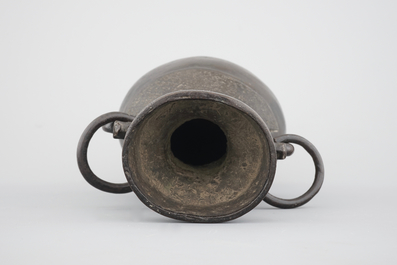 A Chinese bronze elongated bottle-shaped vase, Ming Dynasty
