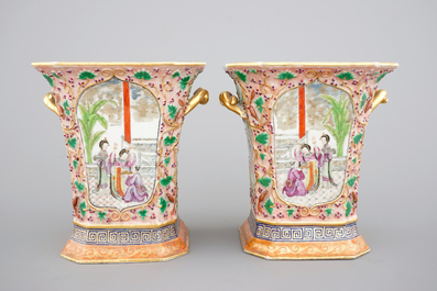 A pair of Chinese famille rose relief-decorated export porcelain bough pots, Qianlong, 18th C.