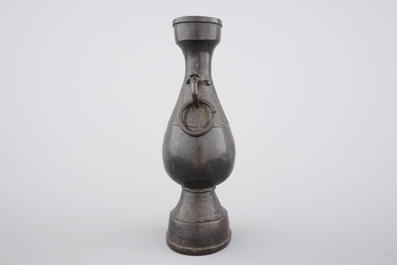 A Chinese bronze elongated bottle-shaped vase, Ming Dynasty