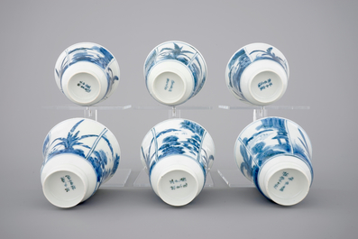 A set of six Japanese blue and white wine cups and saucers, 18/19th C.