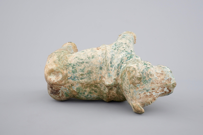 A Chinese green glazed pottery figure of a dog, presumably Han Dynasty
