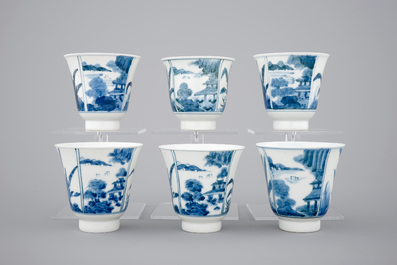 A set of six Japanese blue and white wine cups and saucers, 18/19th C.