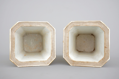 A pair of Chinese famille rose relief-decorated export porcelain bough pots, Qianlong, 18th C.
