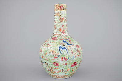 A Chinese celadon-ground blue and white porcelain bottle-shaped vase with Cantonese overdecoration, 19th C.