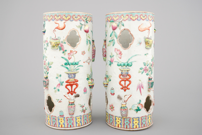 A pair of Chinese famille rose porcelain relief-moulded hat stands, 19th C.