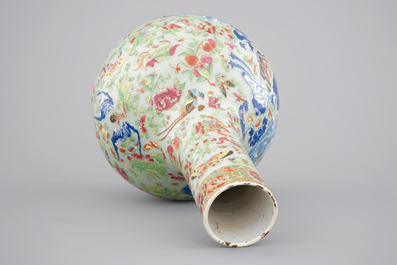 A Chinese celadon-ground blue and white porcelain bottle-shaped vase with Cantonese overdecoration, 19th C.