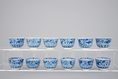 A set of 12 Chinese porcelain blue and white cups and saucers, 19th C