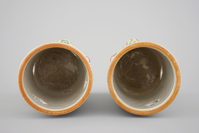 A pair of Chinese famille rose porcelain relief-moulded hat stands, 19th C.