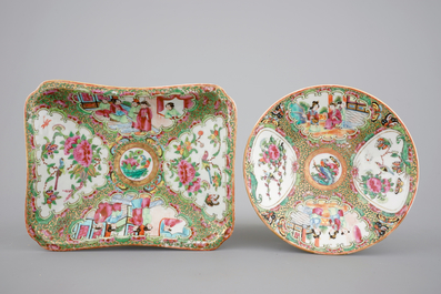 A group of Chinese Canton famille rose wares: a pair of candlesticks, a covered bowl on stand and a oblong tray, 19th C