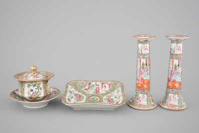 A group of Chinese Canton famille rose wares: a pair of candlesticks, a covered bowl on stand and a oblong tray, 19th C