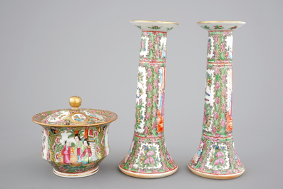 A group of Chinese Canton famille rose wares: a pair of candlesticks, a covered bowl on stand and a oblong tray, 19th C