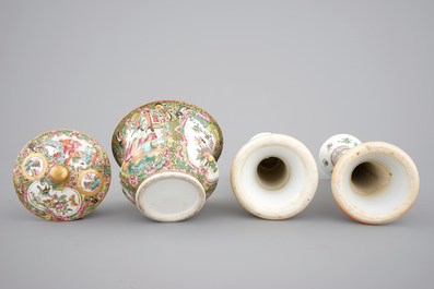 A group of Chinese Canton famille rose wares: a pair of candlesticks, a covered bowl on stand and a oblong tray, 19th C