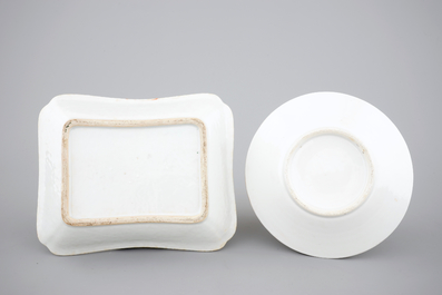 A group of Chinese Canton famille rose wares: a pair of candlesticks, a covered bowl on stand and a oblong tray, 19th C