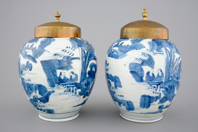 A pair of blue and white Japanese porcelain vases with brass covers in Chinese transitional style, Edo, 17th C.