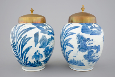 A pair of blue and white Japanese porcelain vases with brass covers in Chinese transitional style, Edo, 17th C.