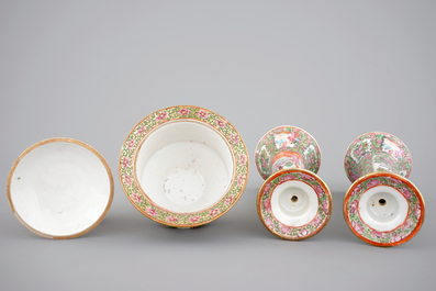 A group of Chinese Canton famille rose wares: a pair of candlesticks, a covered bowl on stand and a oblong tray, 19th C
