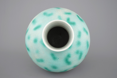 A rare Chinese green-spotted porcelain tianqu ping vase with anhua design of fighting dragons, 19th C.