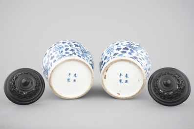 A pair of blue and white Chinese porcelain dragon vases, 19th C.