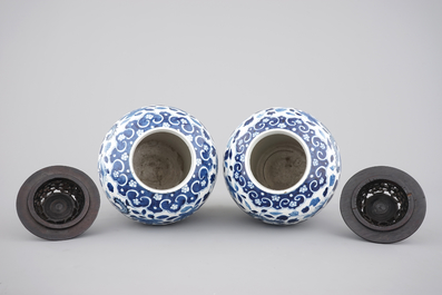 A pair of blue and white Chinese porcelain dragon vases, 19th C.