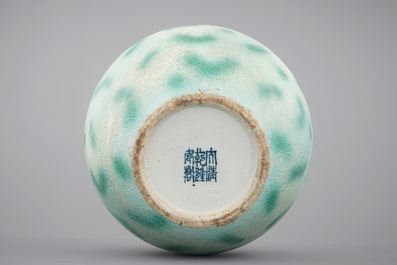 A rare Chinese green-spotted porcelain tianqu ping vase with anhua design of fighting dragons, 19th C.