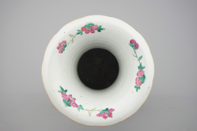 A tall Chinese porcelain famille rose vase with a figural scene, 19th C.