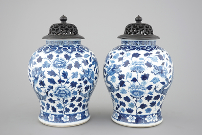 A pair of blue and white Chinese porcelain dragon vases, 19th C.