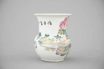 A tall Chinese porcelain famille rose vase with a figural scene and a small Qianjiang type vase, 19th C.
