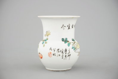 A tall Chinese porcelain famille rose vase with a figural scene and a small Qianjiang type vase, 19th C.