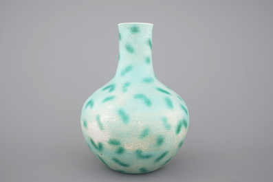 A rare Chinese green-spotted porcelain tianqu ping vase with anhua design of fighting dragons, 19th C.