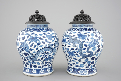 A pair of blue and white Chinese porcelain dragon vases, 19th C.