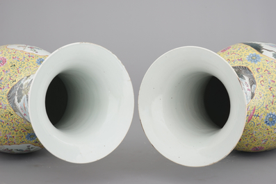 A massive pair of Chinese famille jaune and rose vases with elephants, early 19th C.